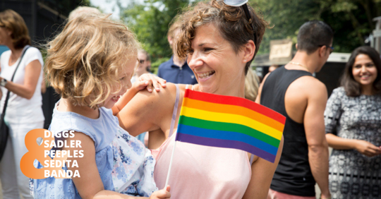 A mother and daughter attend an LGBTQ+ celebration