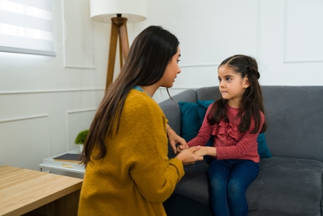 woman talking to her daughter