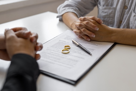 couple getting a divorce in lawyer's office