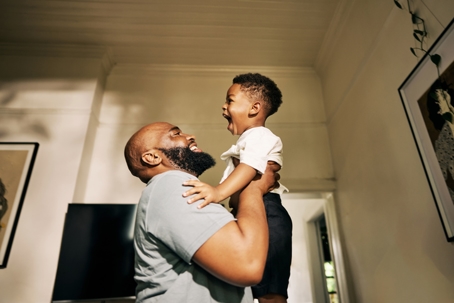 father playing with son