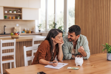 happy couple discussing finances